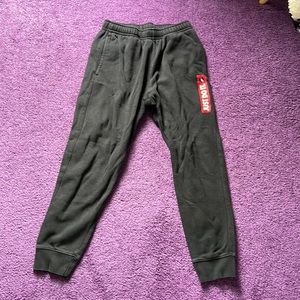 Nike men’s joggers. Size medium. Black with red detail